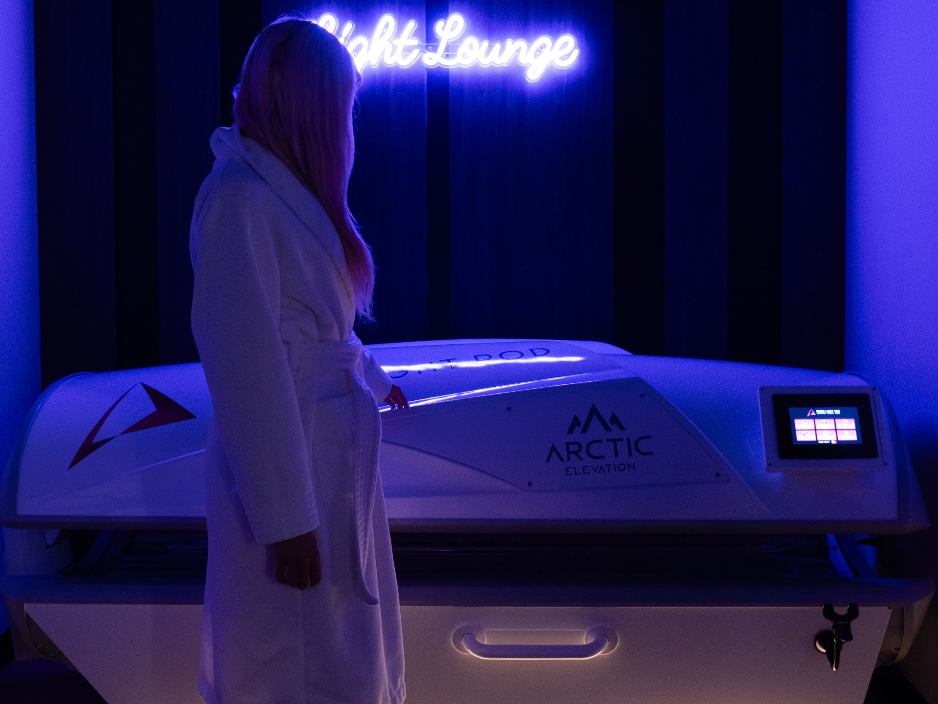Full-body red light therapy pod at Arctic Elevation